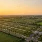 Sunsetoversuburbandevelopmentgri 85x85